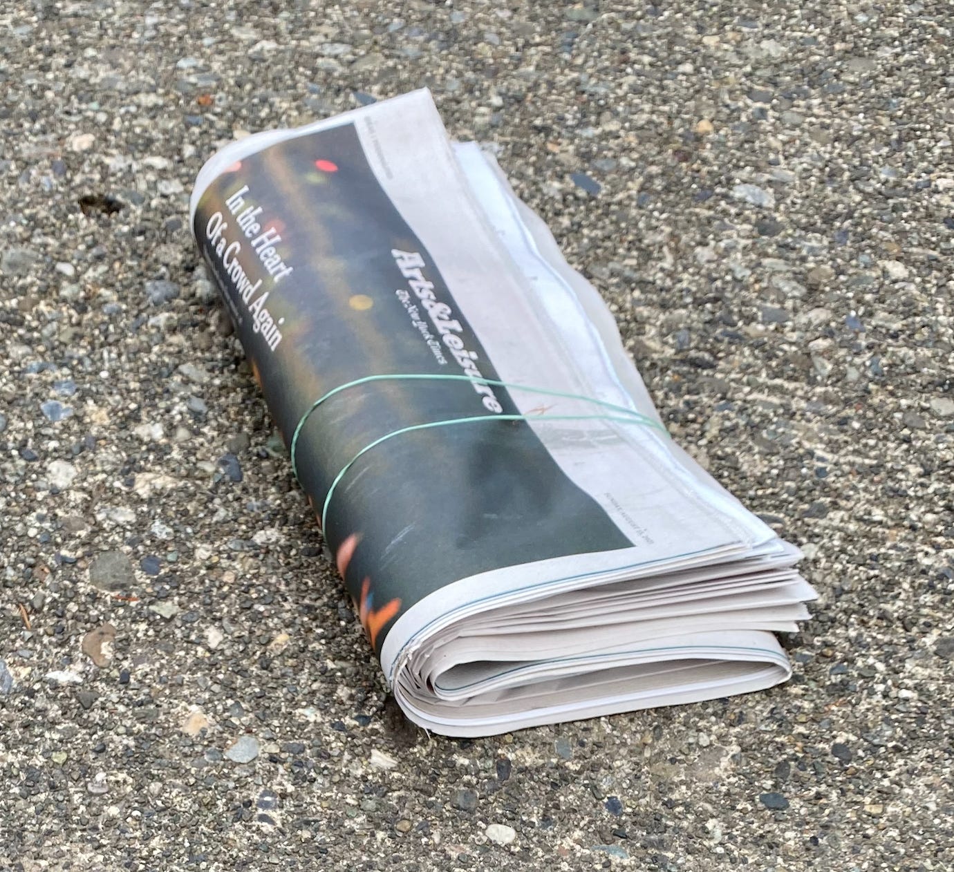 The Sunday New York Times on a Clyde Hill driveway. Photo credit: Joan Morse