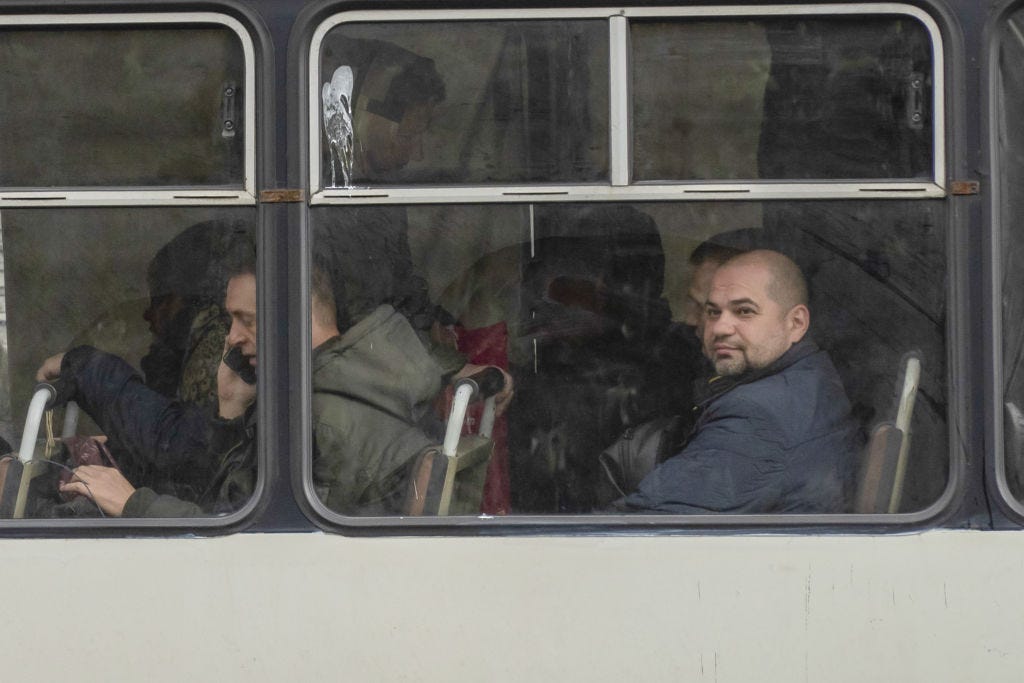 Russian army recruits on board of a bus taking them to mobilisation centres. © Evgenii Bugubaev/Anadolu Agency via Getty Images