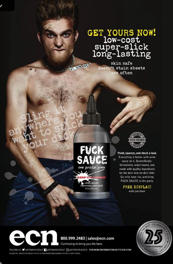 Full page ad from ECN for their Fuck Sauce water based lube. The ad features a bottle of the lube in front of a topless model with a raver/club/skater-punk vibe, grabbing his crotch over his blue pants.
