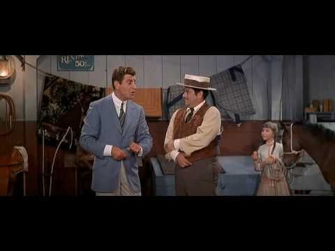 Still of Howard Hill and a friend and a small girl from the movie "The Music Man" Still of Howard Hill and a friend and a small girl from the movie "The Music Man"
