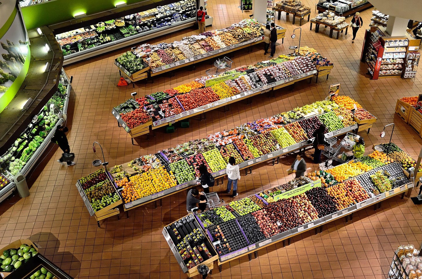 Looking down on the produce section of a supermarket. So much abundance!