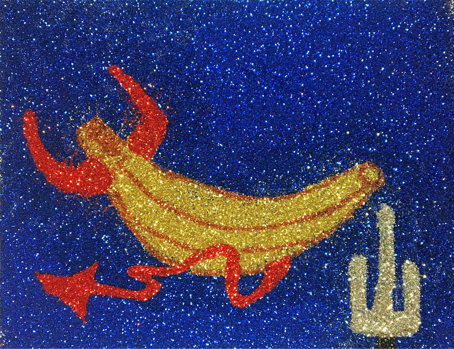 A banana with devil horns and a tail lies on its back against a deep sky next to a cactus.