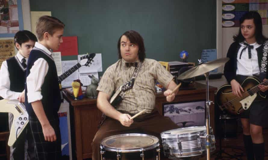 ‘he loved music’ … Kevin Clark, second left, gets a drumming lesson from Jack Black in School of Rock.