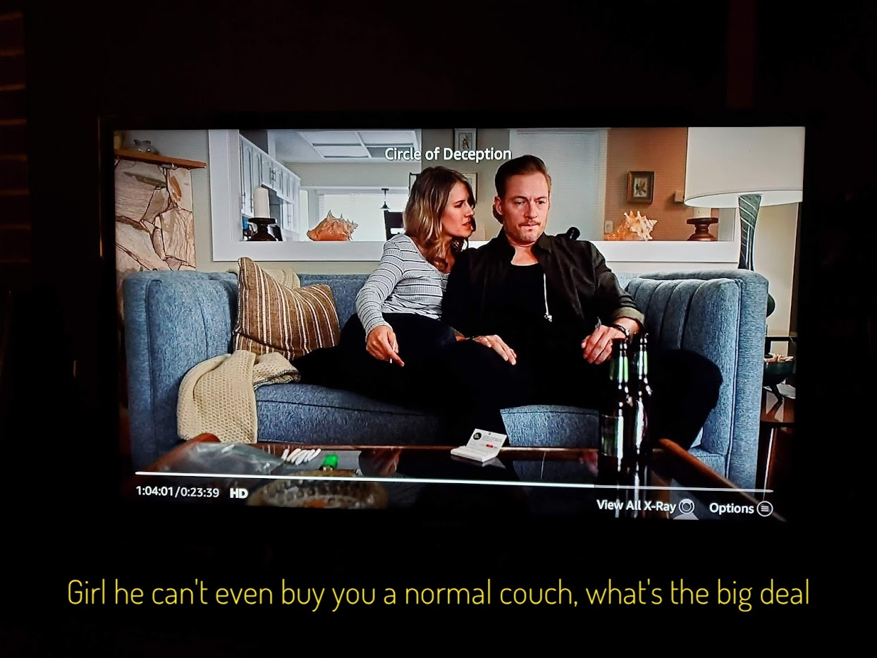 Jean, holding a joint, snuggling with Jim on a tiny couch, captioned "Girl he can't even buy you a normal couch, what's the big deal"