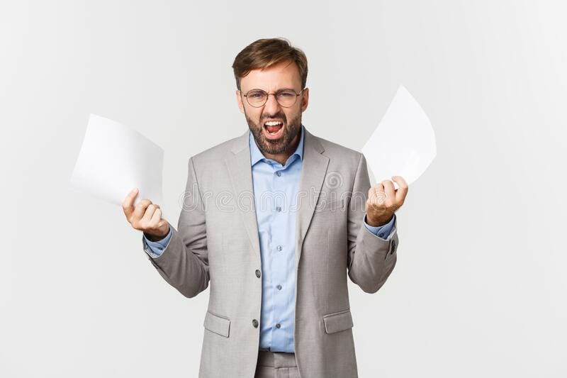 Portrait of Angry Businessman in Grey Suit and Glasses, Disappointed with  Bad Report, Holding Documents and Scolding Stock Photo - Image of employee,  modern: 203394906