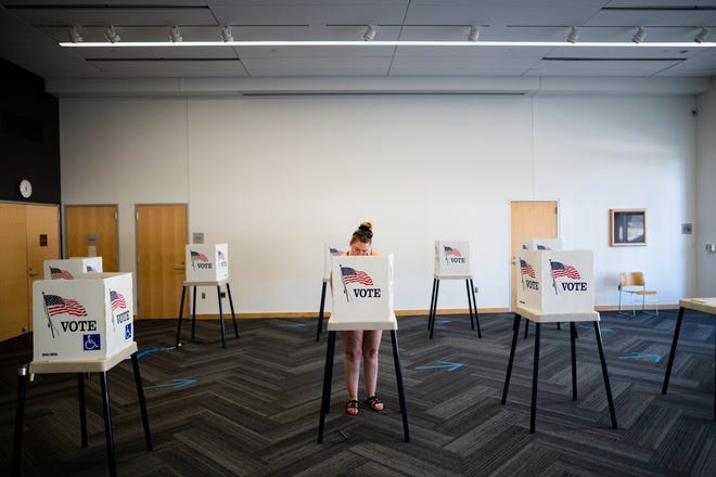A voter fills out a ballot at the Ames Public Library on primary Election Day on June 7, 2022 in Ames, Iowa. Iowa is one of seven states holding primaries today.