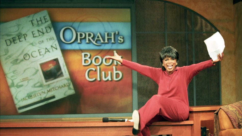 Oprah on her show in the 90s introducing a book club pick