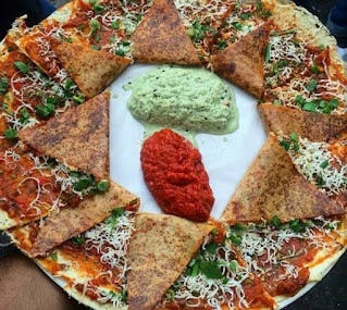 Folks - This is probably closer to Napolitano Pizza than it is to a Masala Dosa