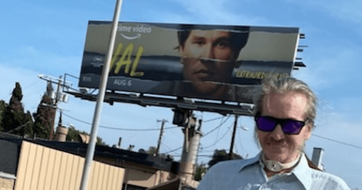 Val Kilmer Poses With Documentary Billboard