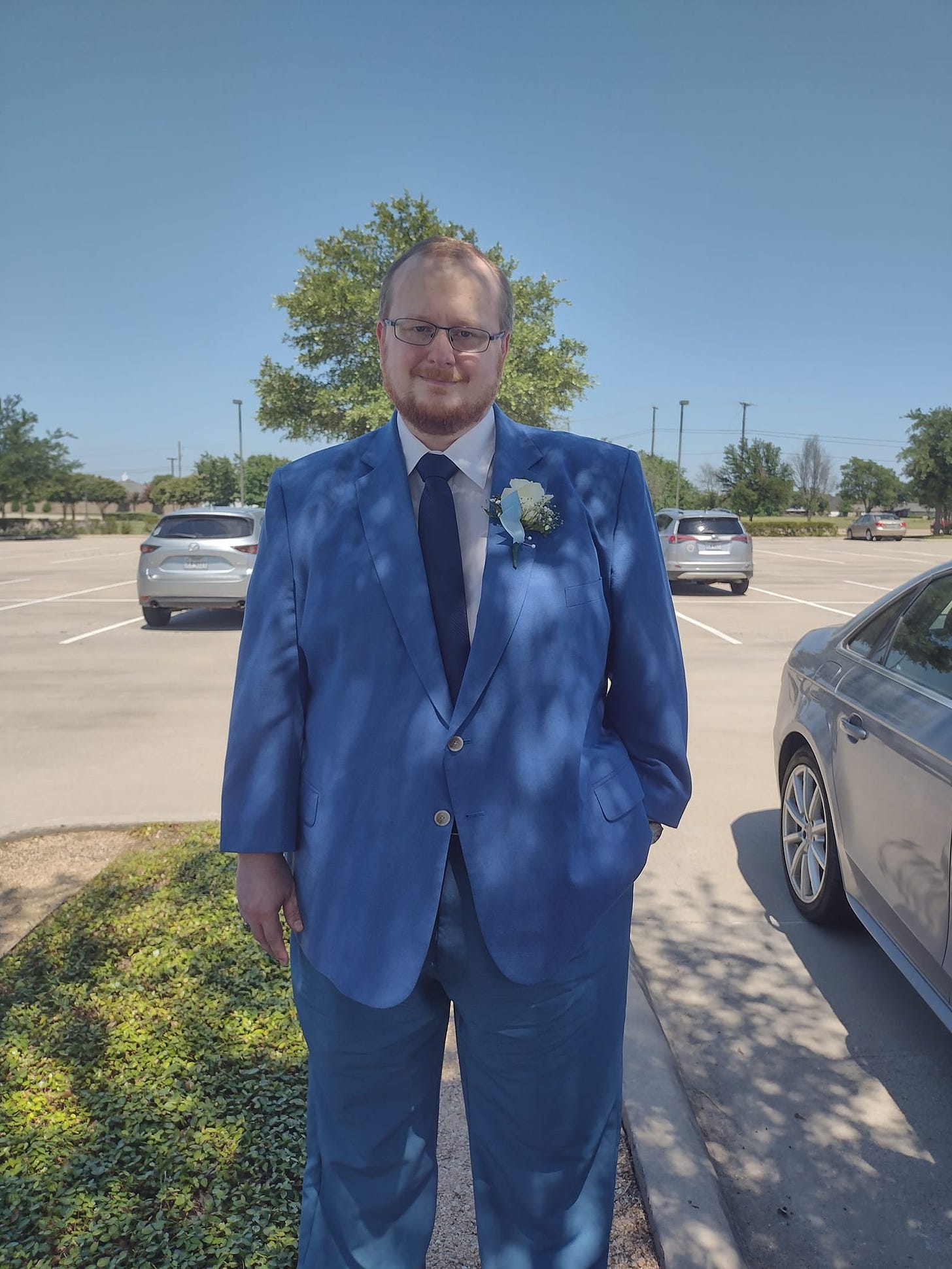 May be an image of 1 person, standing and outdoors