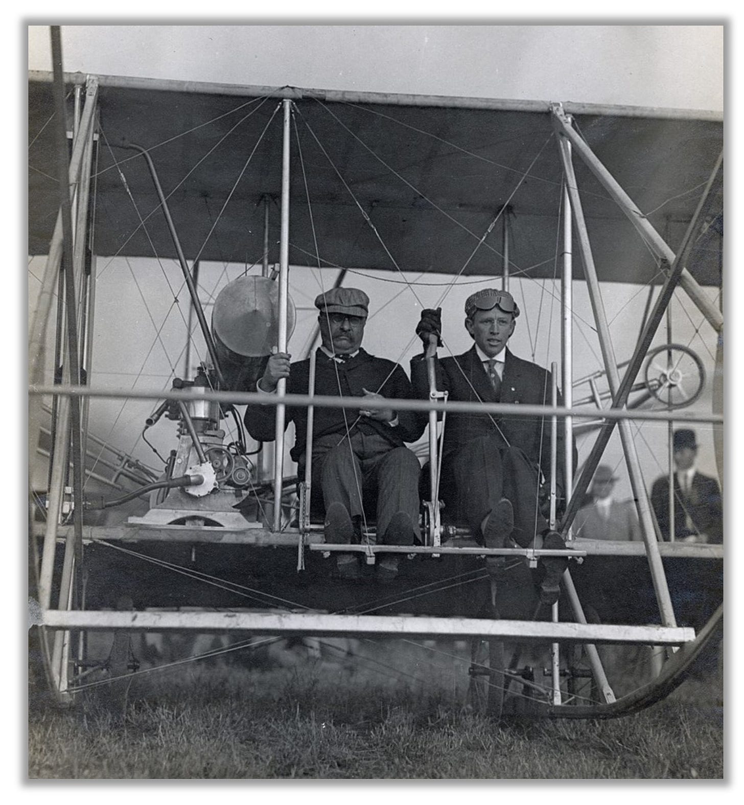 Roosevelt and Hoxsey are pictured aboard the plane, preparing to depart.