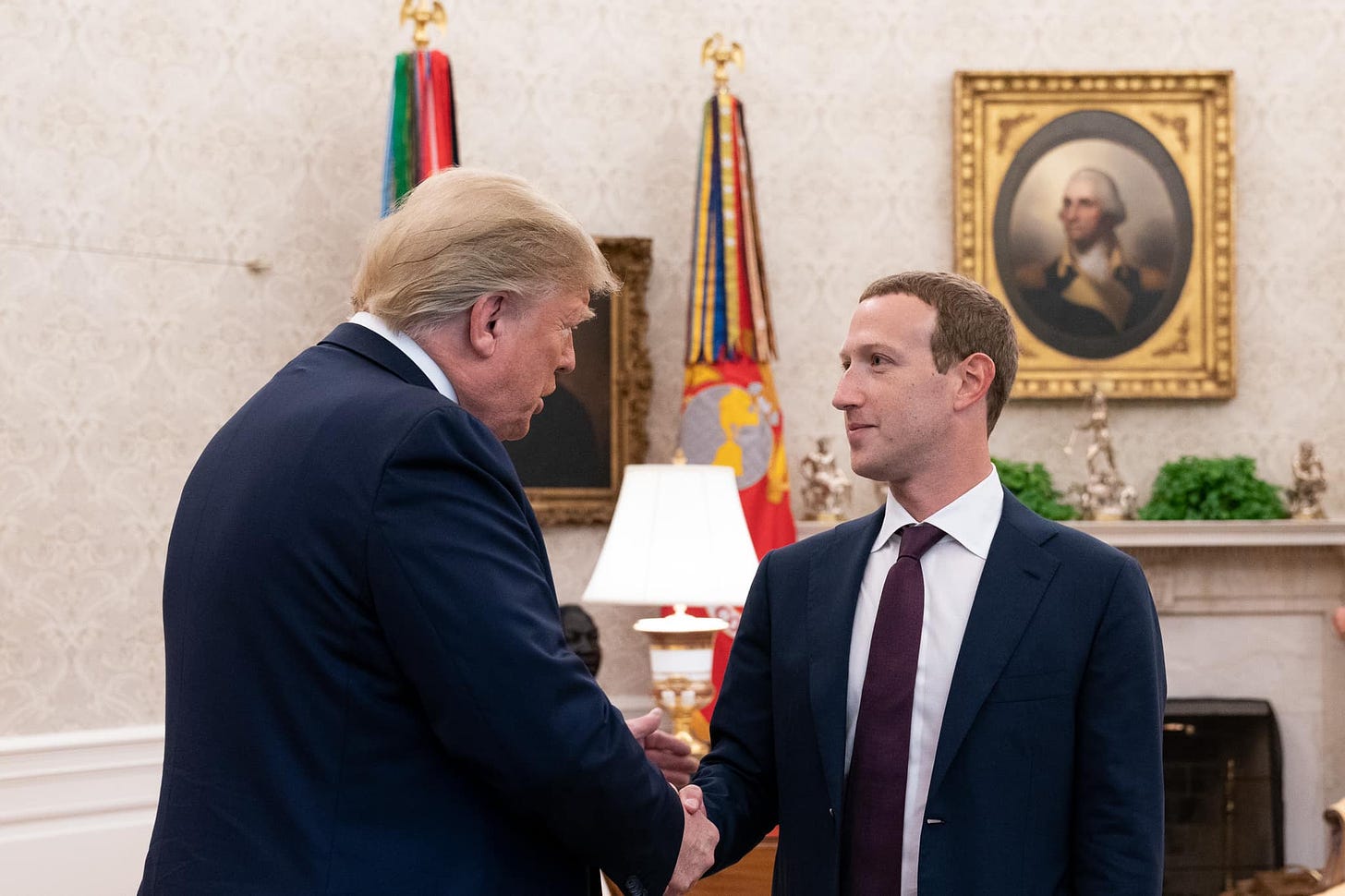 Photo of Donald Trump and Mark Zuckerberg meeting in the White House in 2019.
