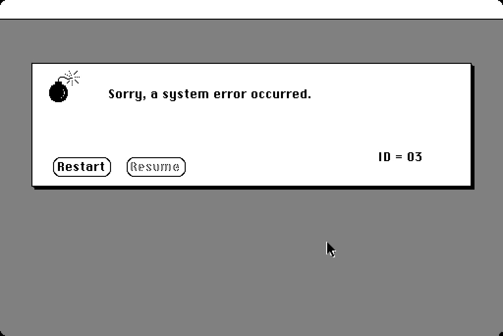 Macintosh error: Sorry a system error has occurred. With a little exploding cartoon bomb.