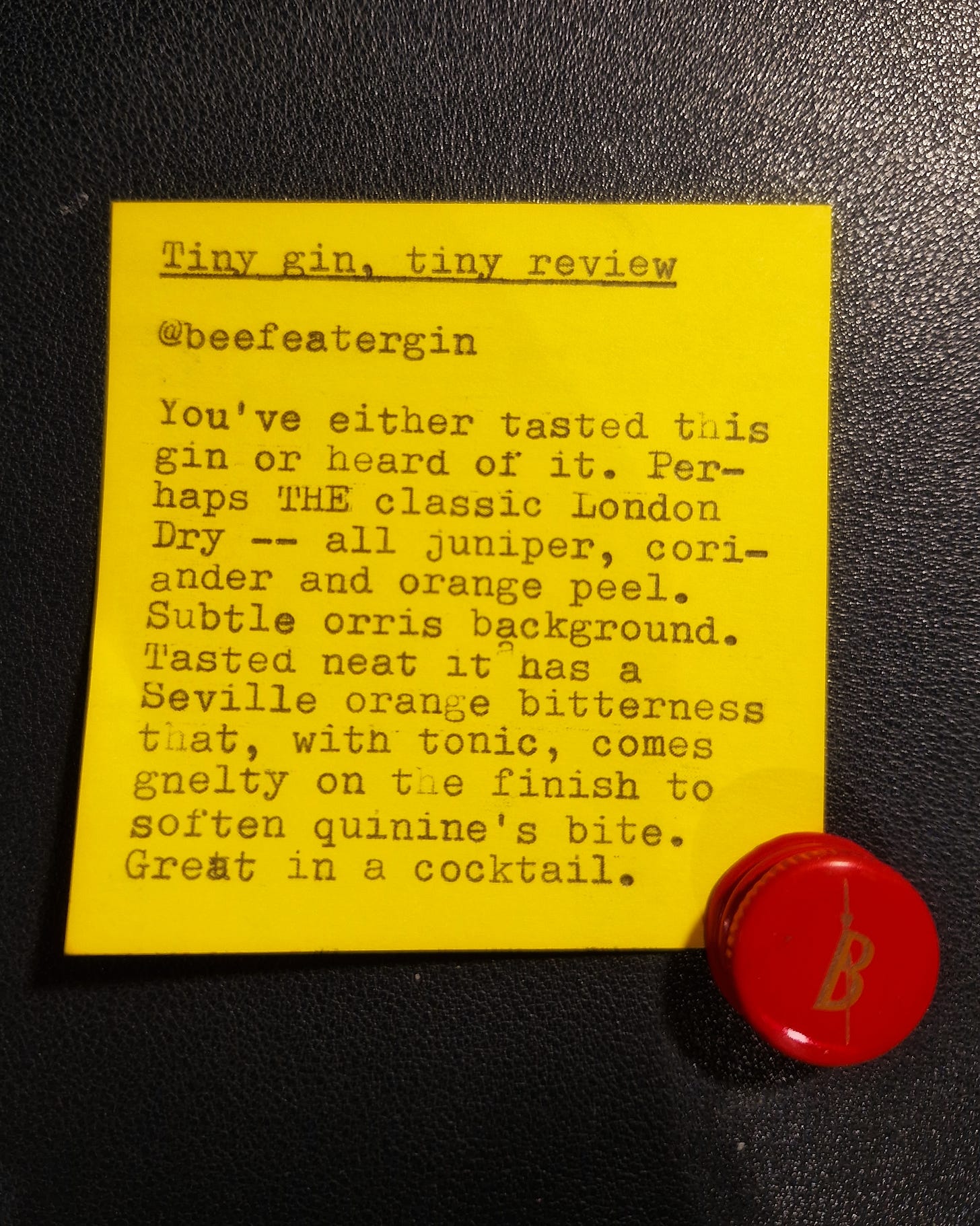 Image of a post-it note, with a typewritten tasting note on it.