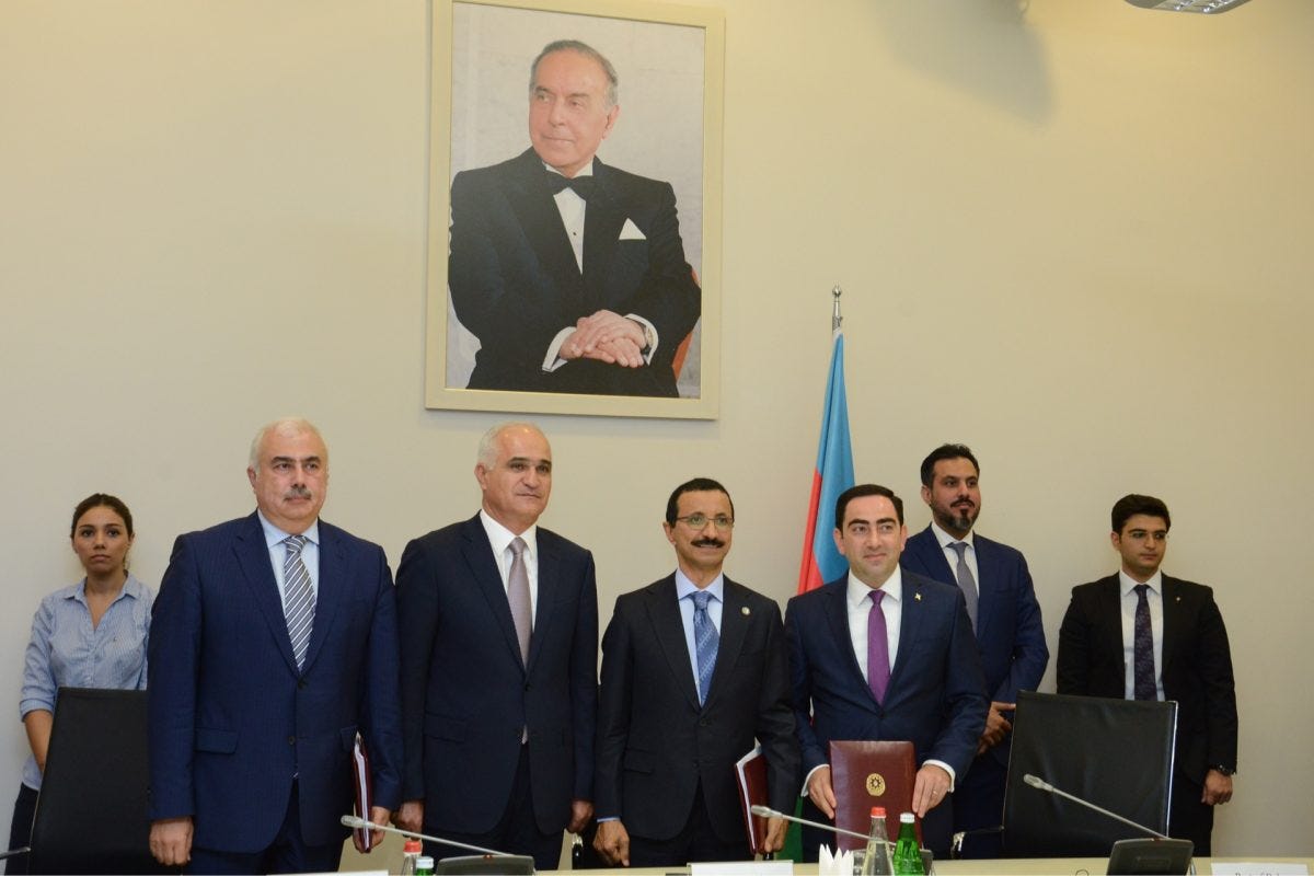 The Azerbaijan government signing a contract with DP World to advise on the development of the FTZ. Image: New Port of Baku.