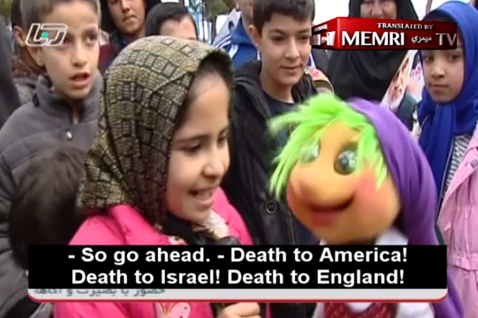 Iranian kids encouraged to chant 'Death to America' by a PUPPET during vile  rallies to celebrate Islamic Revolution | The Sun