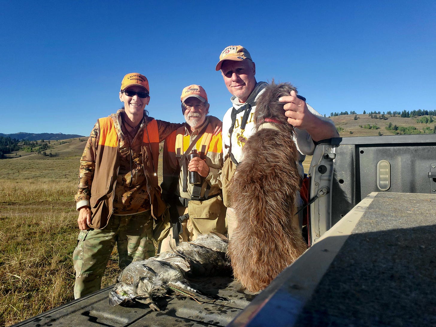 Holly, Jeff and Jim with five grouse