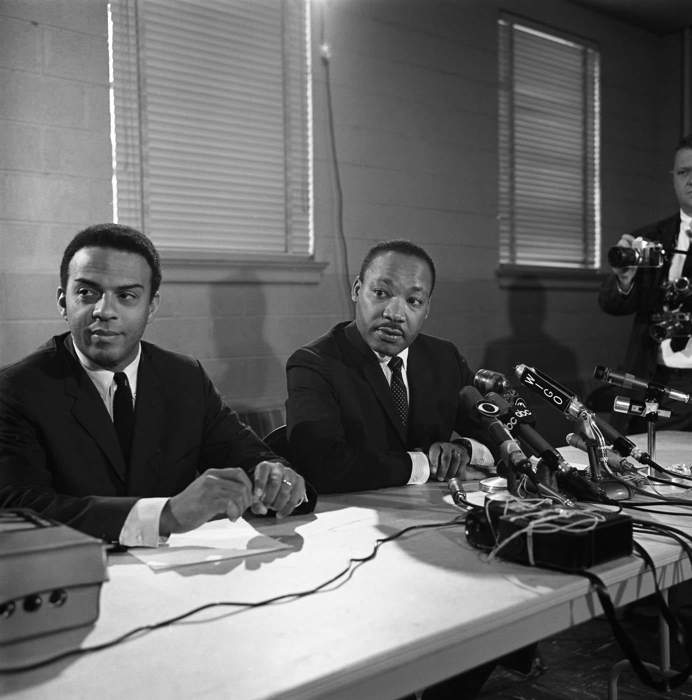 SCLC director Andrew Young and Martin Luther King Jr. during a press conference in April 1967