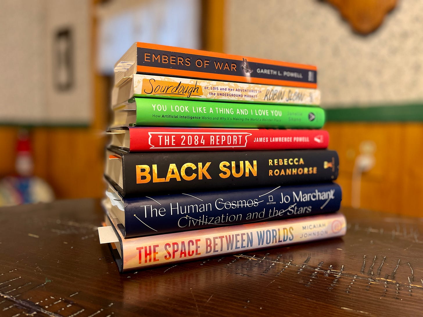 A stack of books on a table. 