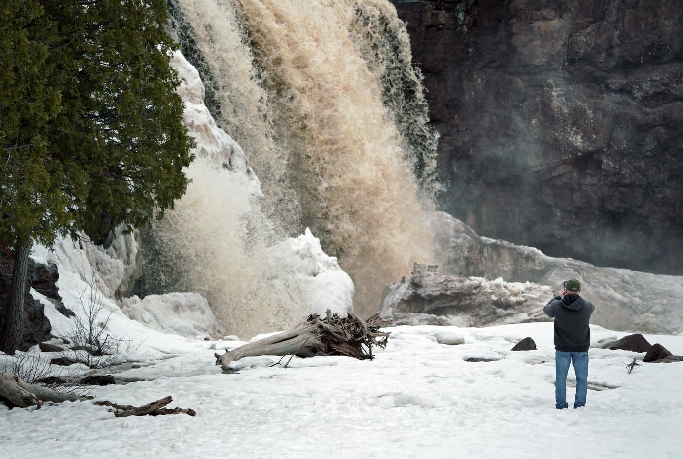 Mother Nature is losing her grip on winter along the North Shore of Lake Superior, triggering a flood of water rushing down Gooseberry Falls here and 