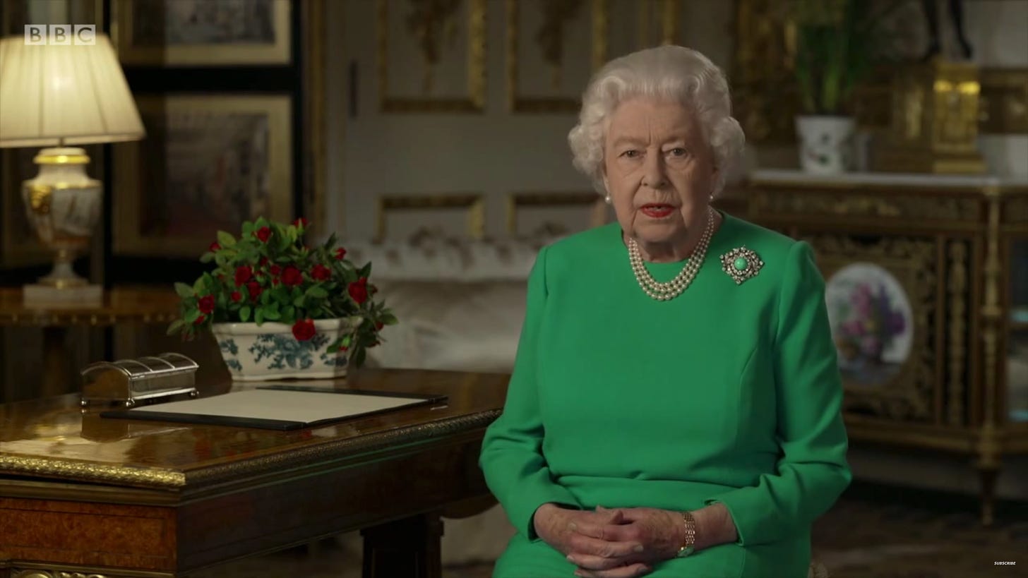 Queen Elizabeth II in green dress.