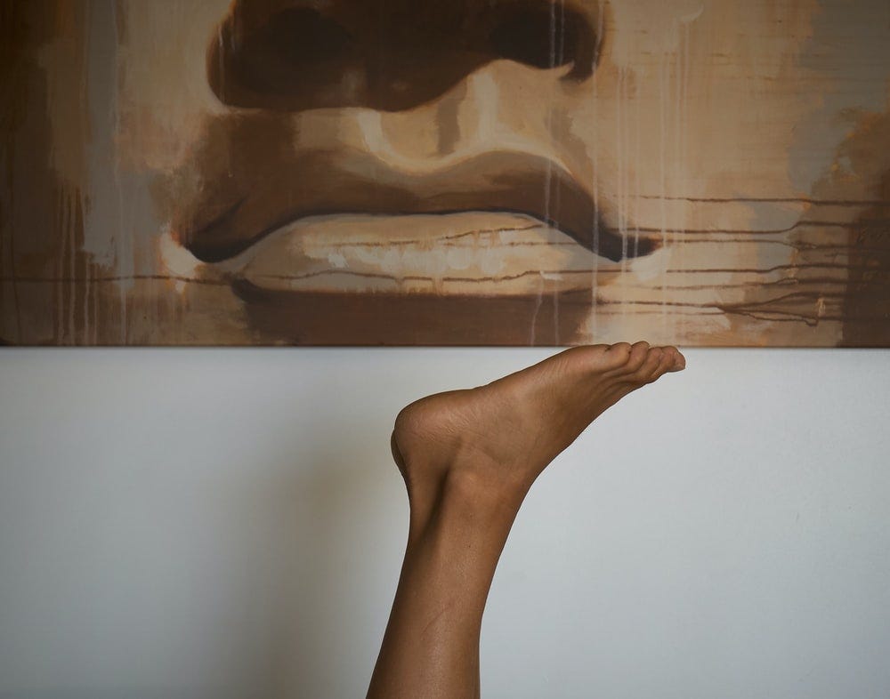 person foot under painting