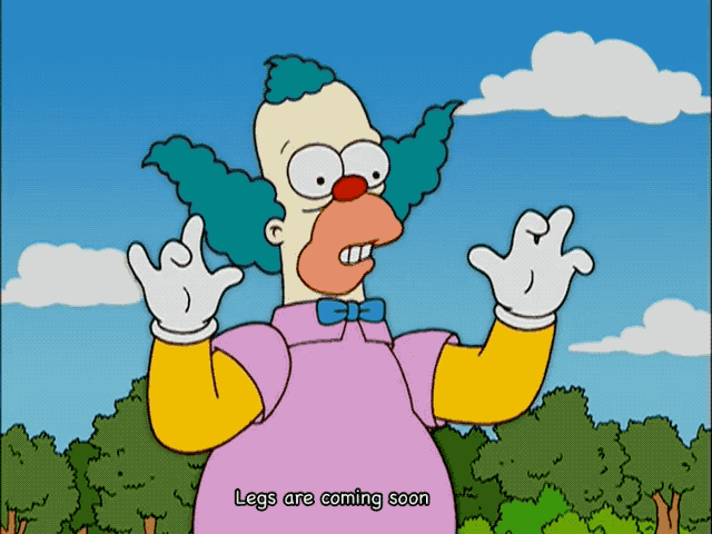 Gif of Krusty the Clown from the Ribwich Simpsons episode, wiggling his clown fingers and saying “Legs are coming soon”