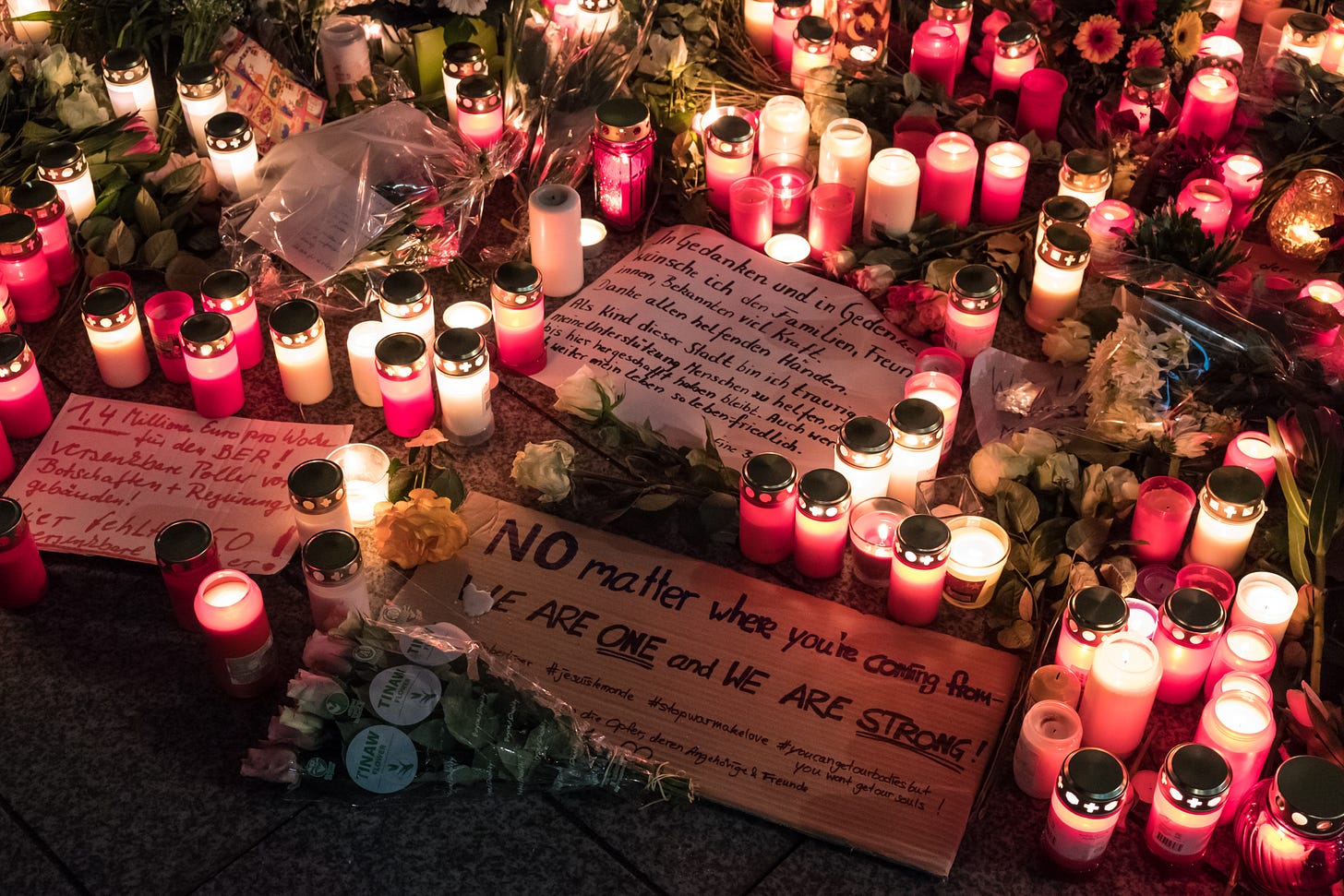 DECEMBER 21, 2016 - BERLIN: flowers and candles after the terror attack on the christmas holiday market a day before, Breitscheidplatz © hanohiki / shutterstock
