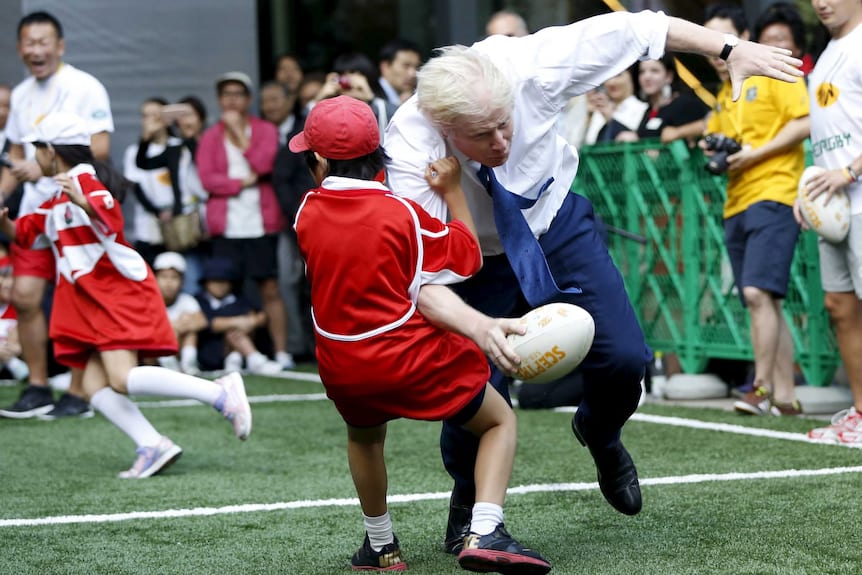 Boris Johnson: London mayor smashes 10-year-old boy during mini-rugby game  in Tokyo - ABC News