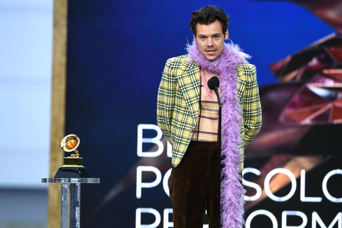 LOS ANGELES, CALIFORNIA - MARCH 14: Harry Styles accepts the Best Pop Solo Performance award for 'Watermelon Sugar' onstage during the 63rd Annual GRAMMY Awards at Los Angeles Convention Center on March 14, 2021 in Los Angeles, California. (Photo by Kevin Winter/Getty Images for The Recording Academy)