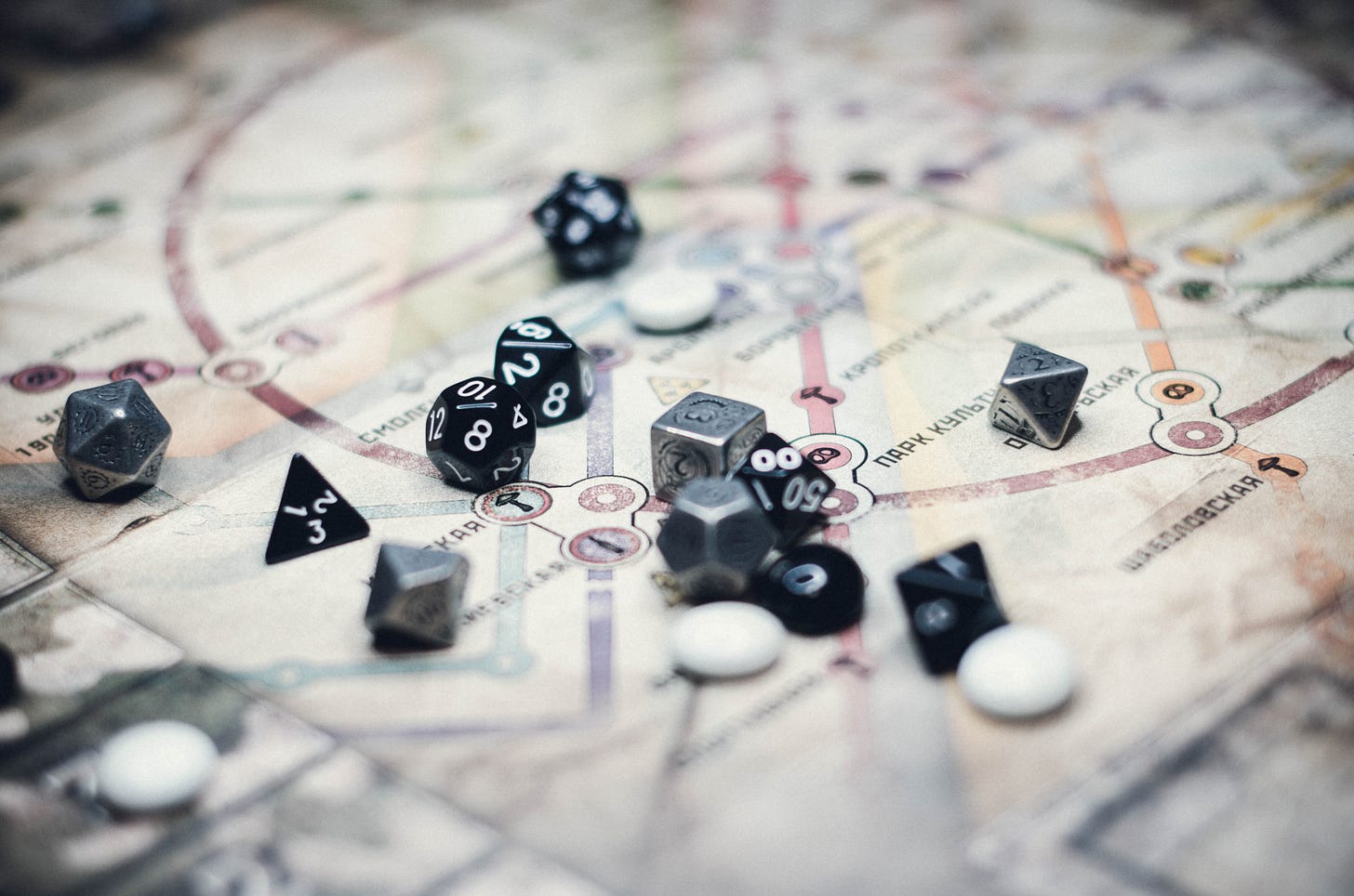 black and white dice on white and black textile photo