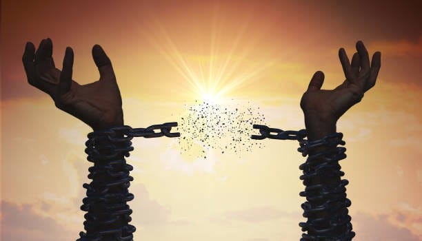 Image of chain hands breaking free