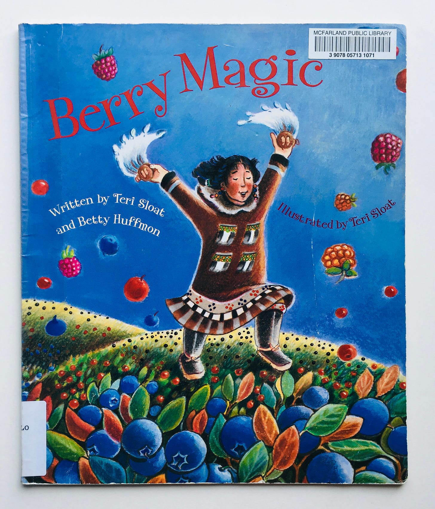 A girl dances across a meadow full of berries with her hands raised 