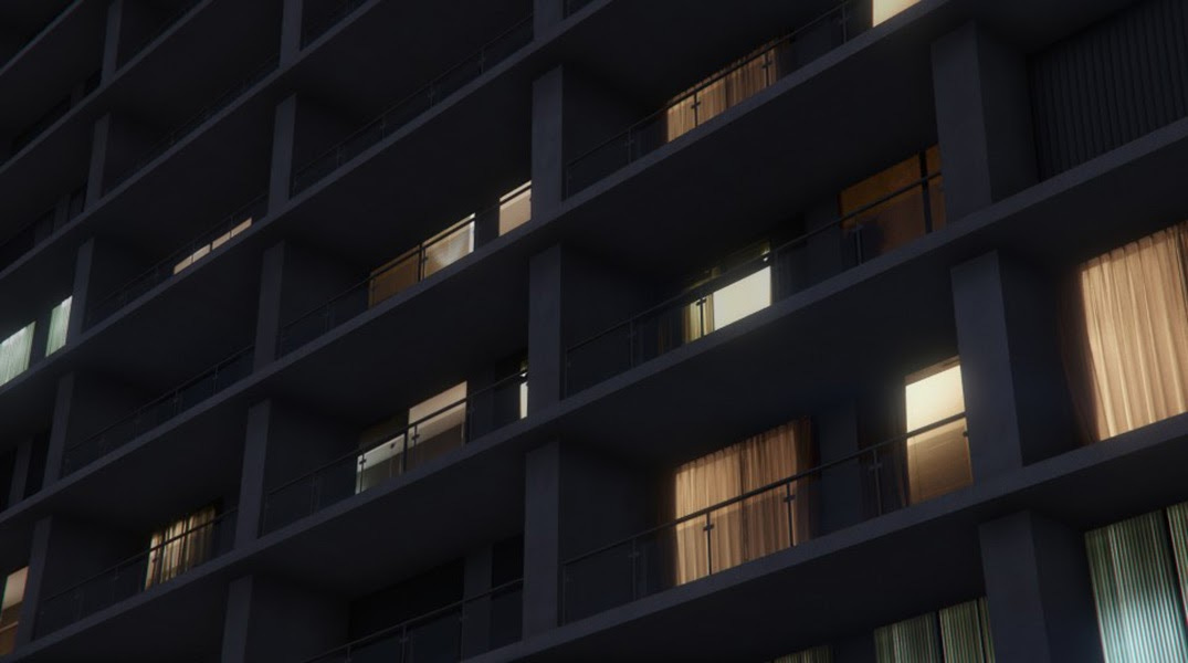 Digital image of an apartment block at night with lights showing through windows