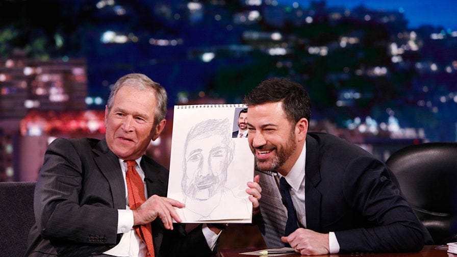 Image may contain George W. Bush Jimmy Kimmel Human Crowd Audience Person Tie Accessories Accessory and Speech