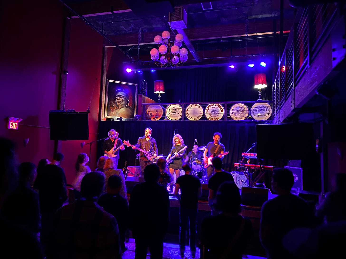 The band Aeon Station plays, bathed in purple light, at Mississippi Studios in Portland, Oregon on Sept. 23, 2020. 