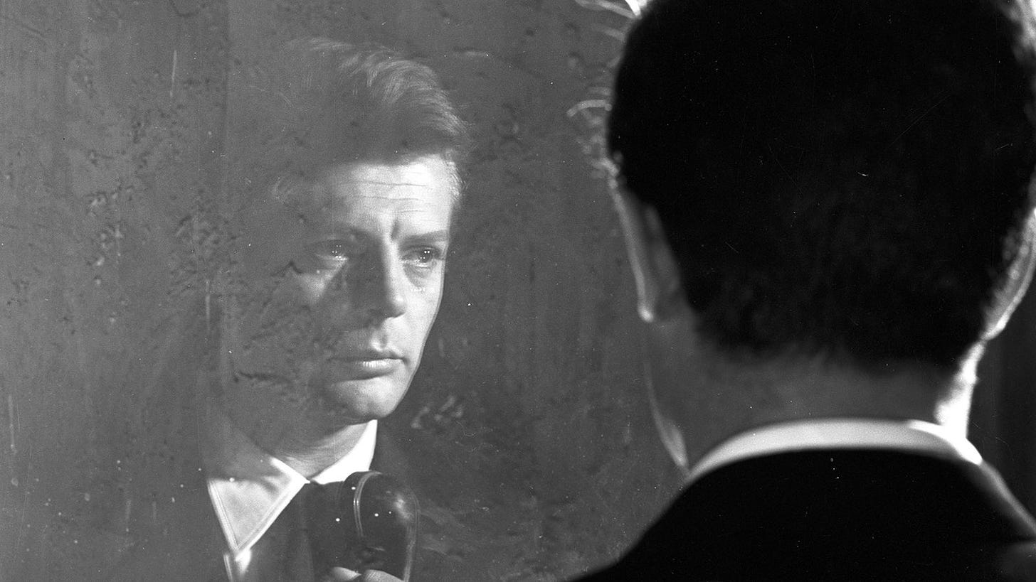 Marcello Mastroianni looking at his own reflection in Fellini’s “La Dolce Vita” (1960)