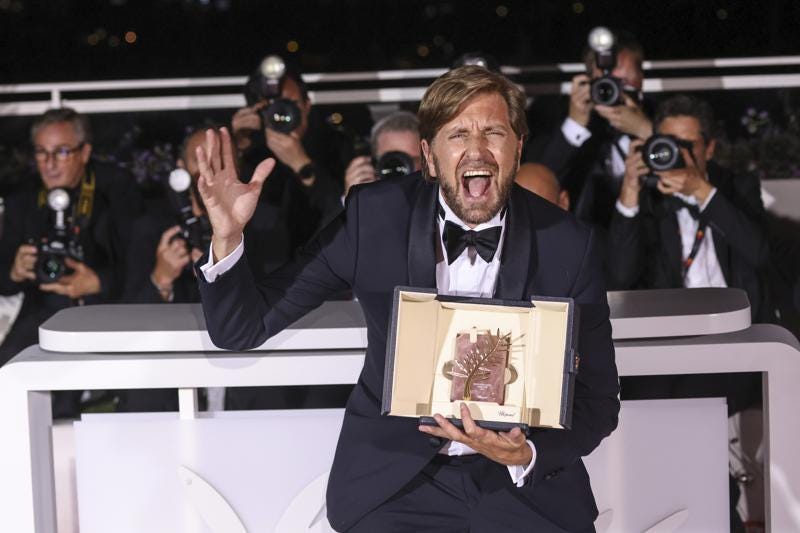 Writer/director Ruben Ostlund, winner of the Palme d'Or for 'Triangle of Sadness,' poses for photographers during the photo call following the awards ceremony at the 75th international film festival, Cannes, southern France, Saturday, May 28, 2022. (Photo by Vianney Le Caer/Invision/AP)