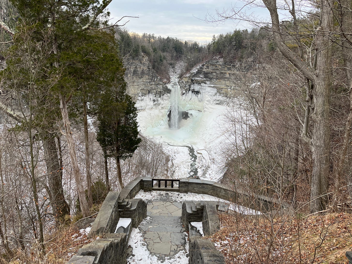 Taughannock Falls waterfall with ice and snow in the gorge