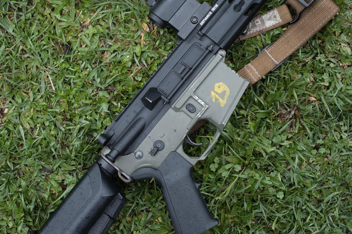Free A Rifle on the Grass Stock Photo