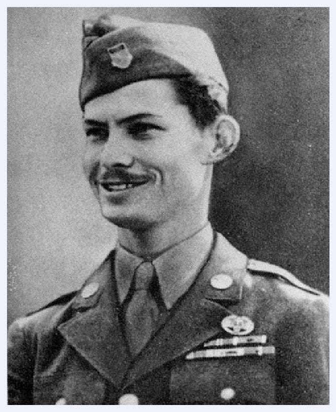 Black and white photo of Desmond Doss, in uniform.