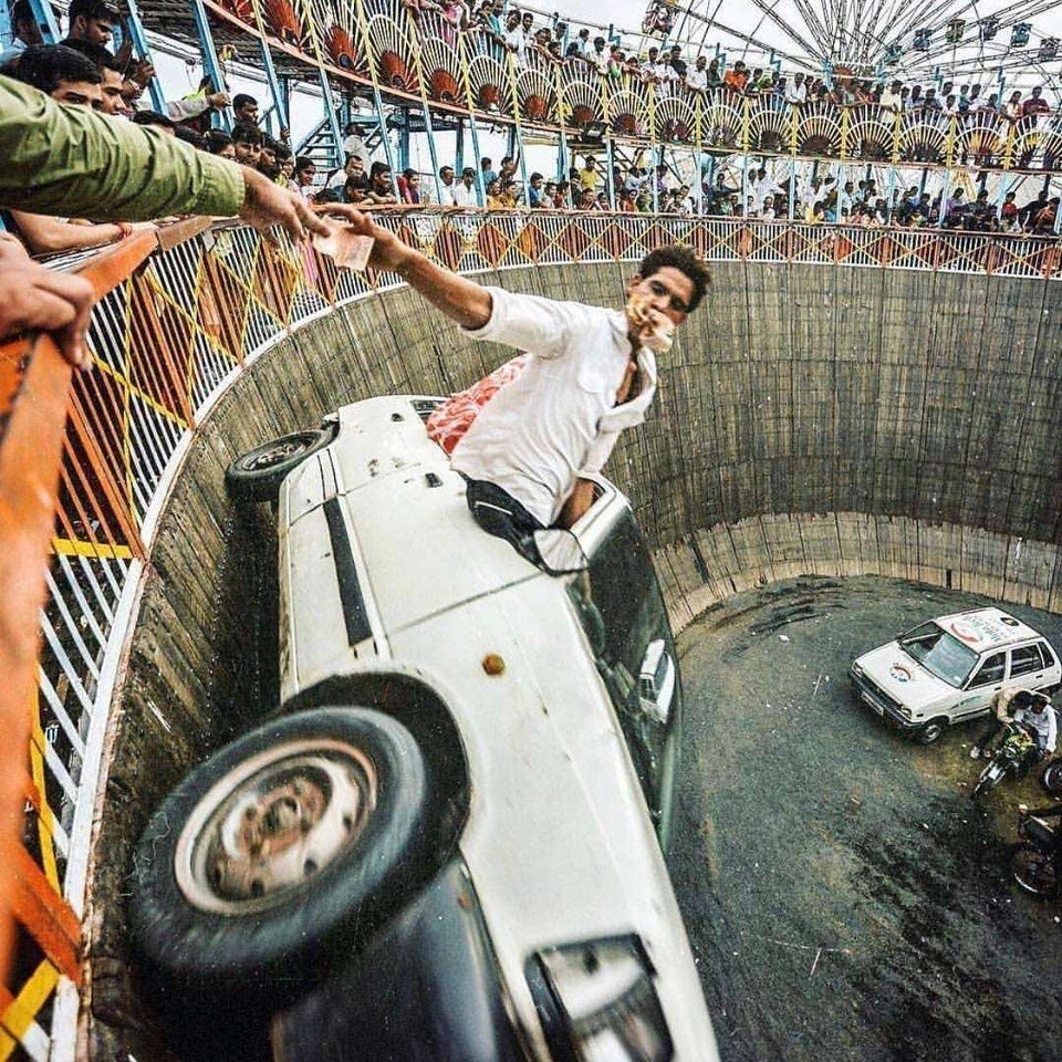 r/pics - Getting paid on the Wall of Death in Rajkot, India