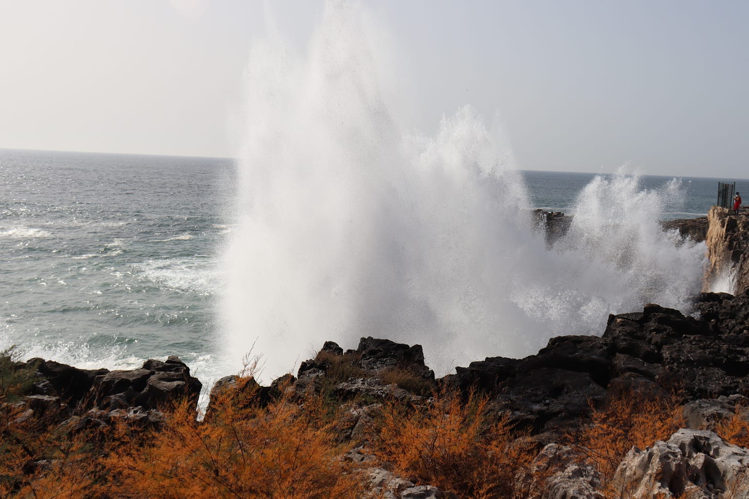 Waves crashing on cliffs