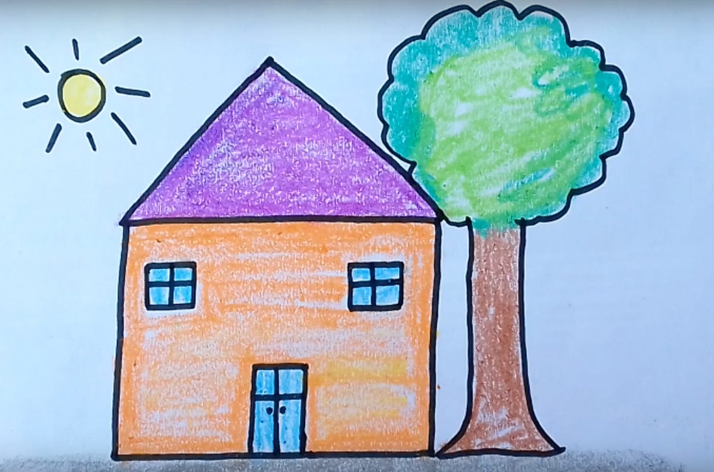 A child's line drawing of a house with one door and two windows. To its left is a big yellow sun and to its right is a tree.
