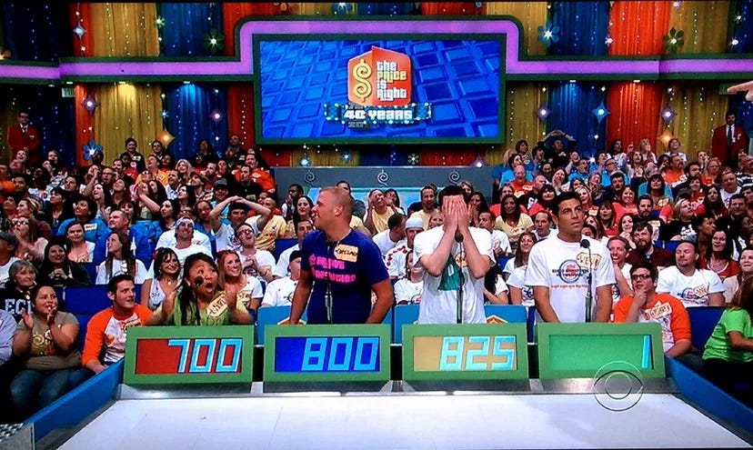 Four contestants compete on the gameshow The Price is Right.