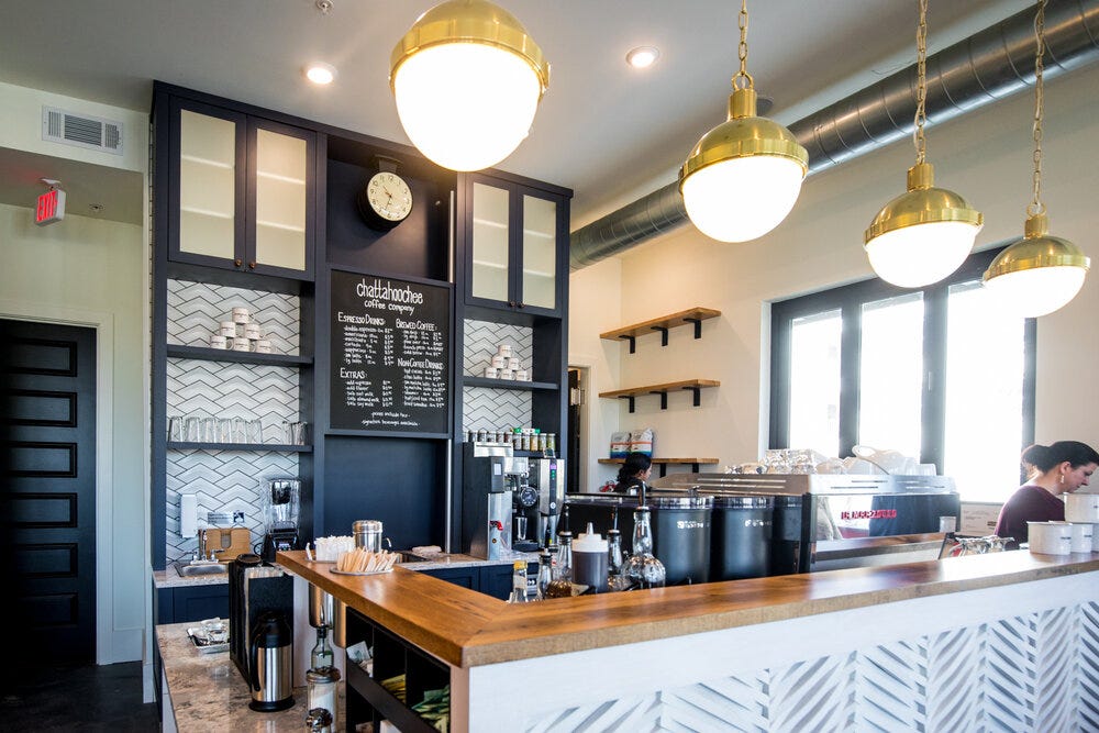 The primary bar area at Chattahoochee Coffee Co. La Marzocco espresso machine is at the center.