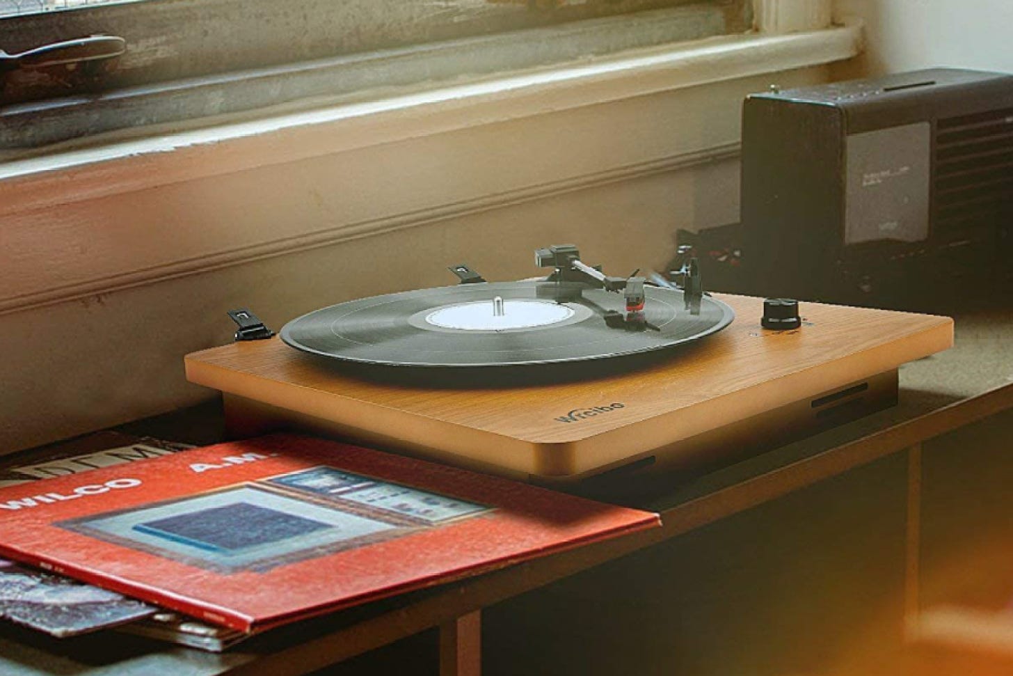 Best Turntables Under $100: Top Affordable Record Player Brands - Rolling  Stone