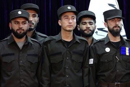 A group of men in uniform

Description automatically generated with medium confidence