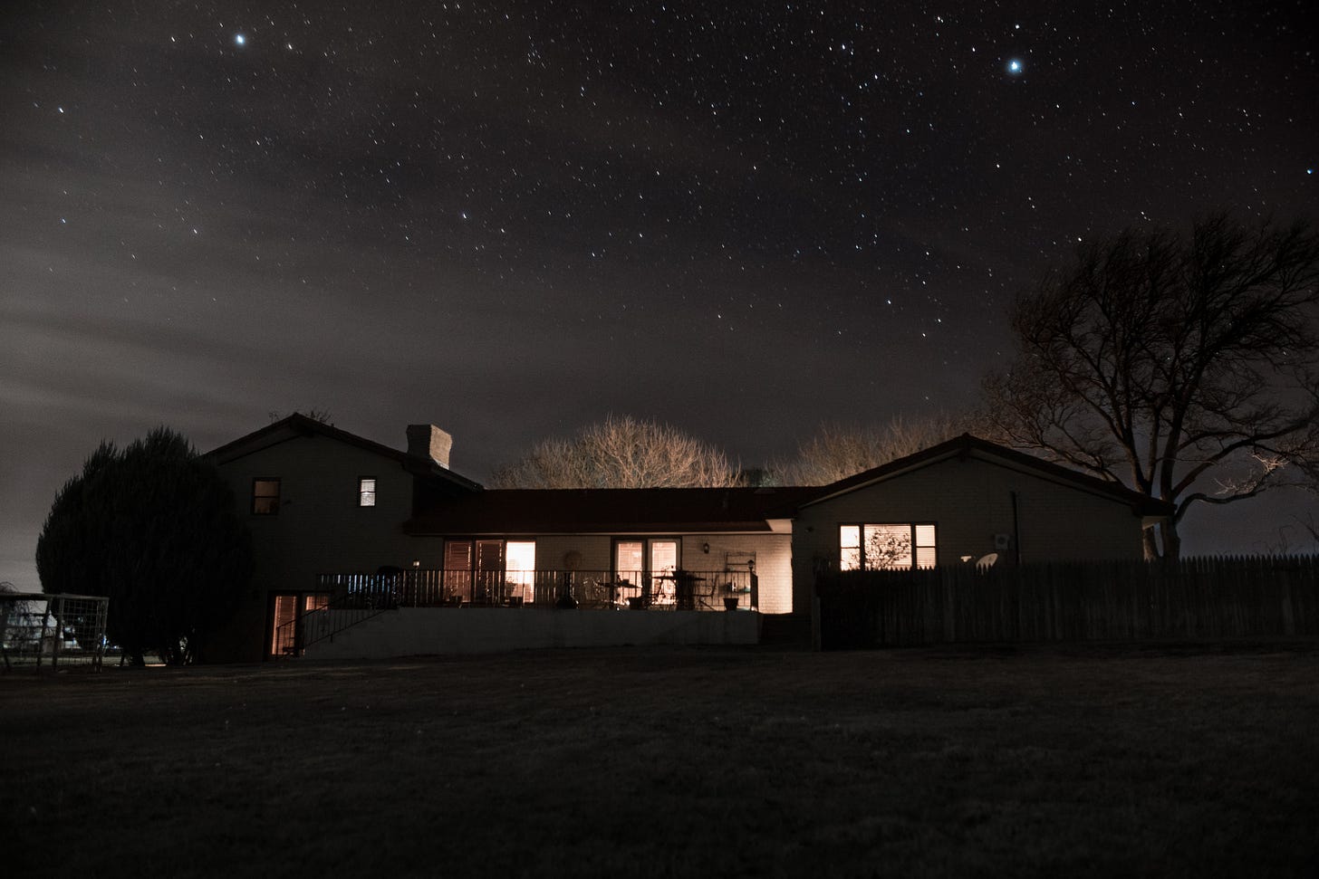 A picture of a home at night.