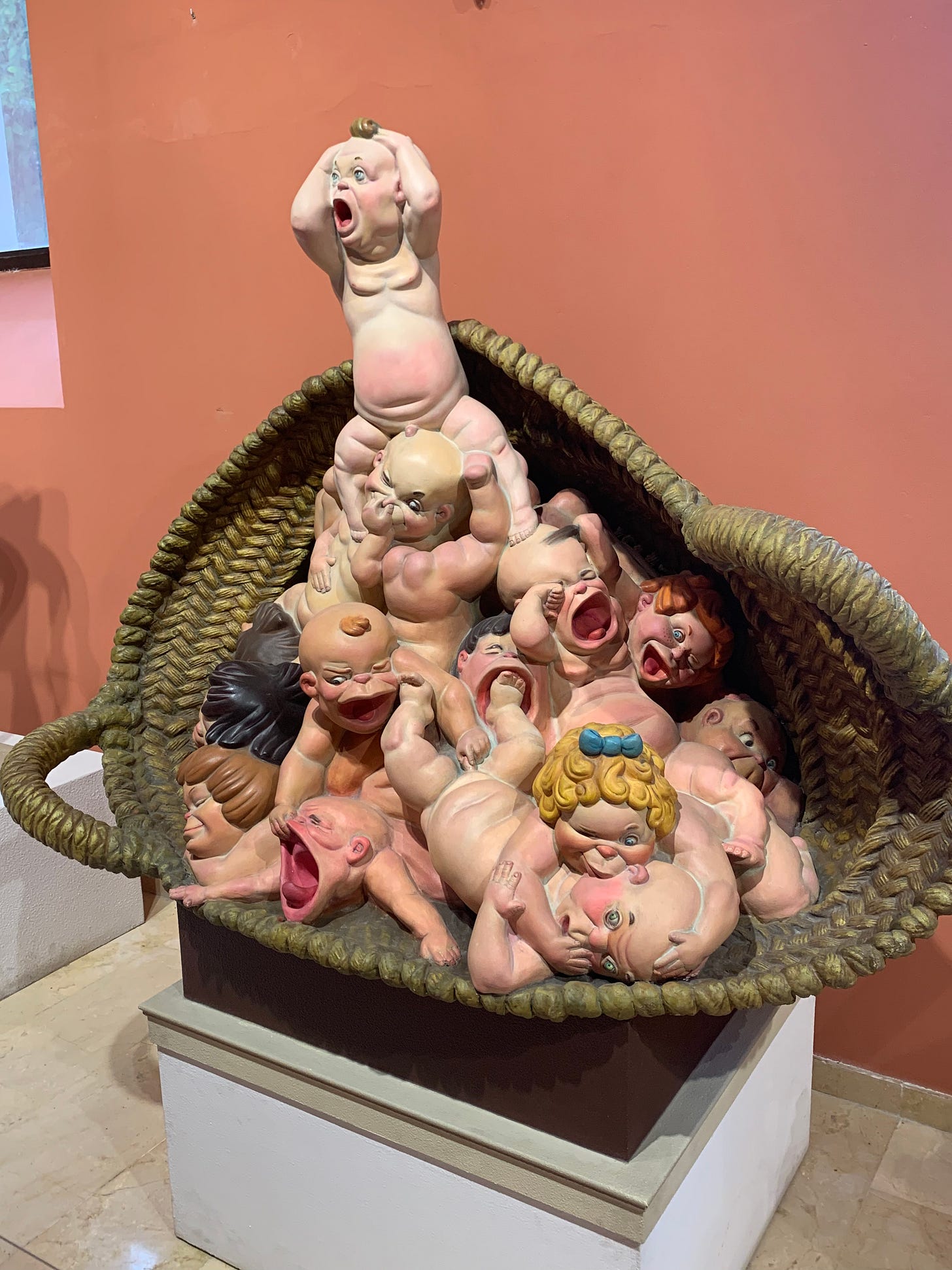 A basket of out of control naked babies